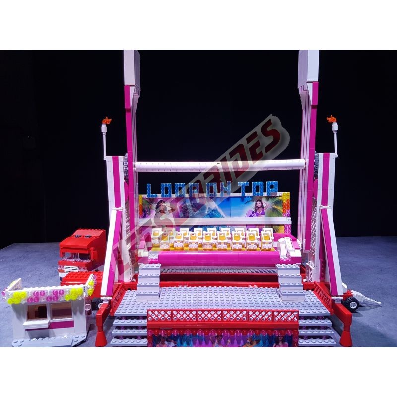  - Loop On Top, Reproduction motorisée de l'attraction foraine "Loop On Top" (Top Spin) en Lego
Transportable sur 2 remorques.
