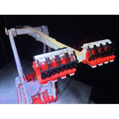 LetsGoRides - Speed32, 
Motorized reproduction of the "Speed32" (KMG) fairground attraction in Lego. Transportable on 4 trailer