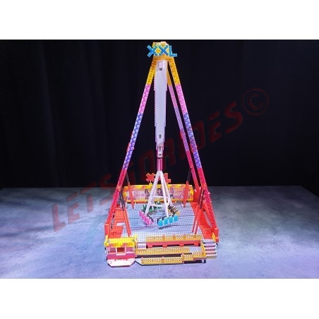 LetsGoRides - XXL, 
Motorized reproduction of the fairground attraction "XXL" made with Lego. Foldable on 3 trailers.
