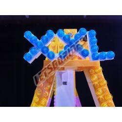  - XXL, Reproduction motorisée de l'attraction foraine "XXL" en Lego
Transportable sur 3 remorques.
