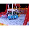 LetsGoRides - XXL, 
Motorized reproduction of the fairground attraction "XXL" made with Lego. Foldable on 3 trailers.
