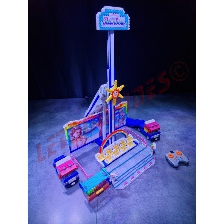 LetsGoRides - Rainbow, 
Motorized reproduction of the fairground attraction "Rainbow" made with Lego bricks. Transportable on 3