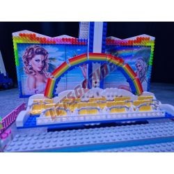 LetsGoRides - Rainbow, 
Motorized reproduction of the fairground attraction "Rainbow" made with Lego bricks. Transportable on 3