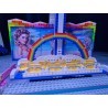 LetsGoRides - Rainbow, 
Motorized reproduction of the fairground attraction "Rainbow" made with Lego bricks. Transportable on 3