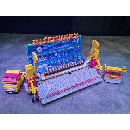 LetsGoRides - Discovery, 
Motorized reproduction of the fairground attraction "Discovery" made with Lego bricks. Transportable 