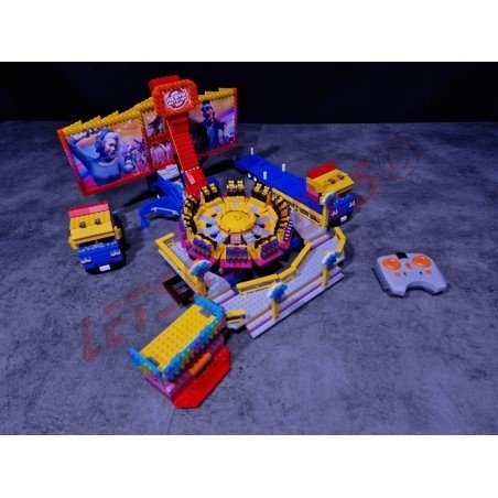 LetsGoRides - Heavy Rotation, 
Motorized reproduction of the fairground attraction "Heavy Rotation" made with Lego bricks
Tran