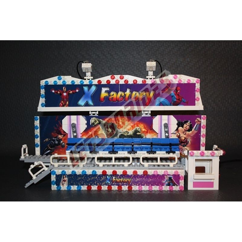 LetsGoRides - X-Factory, Reproduction motorisée de l'attraction foraine "X Factory" en Lego
Transportable sur une remorque. - Jo