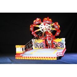 LetsGoRides - SuperStar, Reproduction motorisée de l'attraction foraine "SuperStar" en Lego.
Transportable sur deux remorques. -