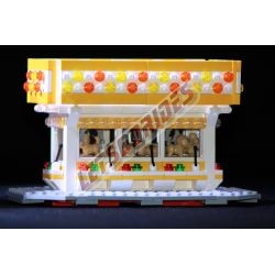 LetsGoRides - Candy Store, 
Reproduction of the fairground attraction "Candy shop" in Lego bricks. Transportable on a trailer.
